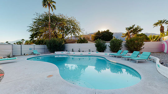 The Summit Palm Springs oversize pool and lounge area.