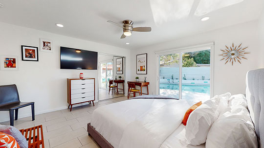 The Summit Palm Springs master bedroom with exquisite furnishings.